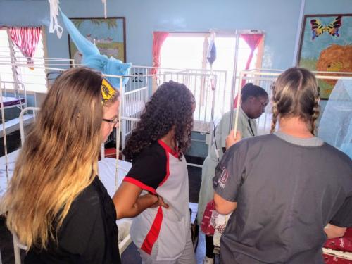 Three OCU students at the Children's ward