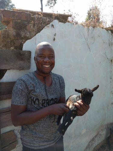 Ezekiel with a baby goat